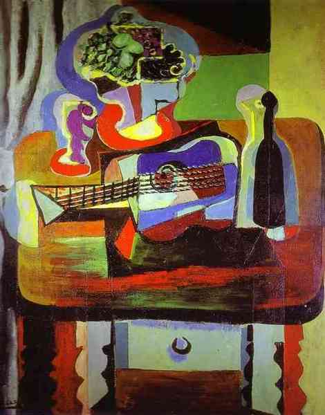 Пабло Пикассо "Гитара, бутылка, ваза с фруктами и бокал на столе." (1919 год)
